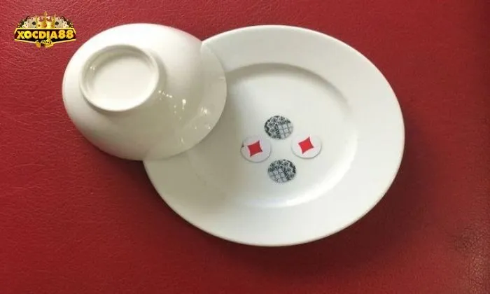 Dụng cụ chơi xóc đĩa